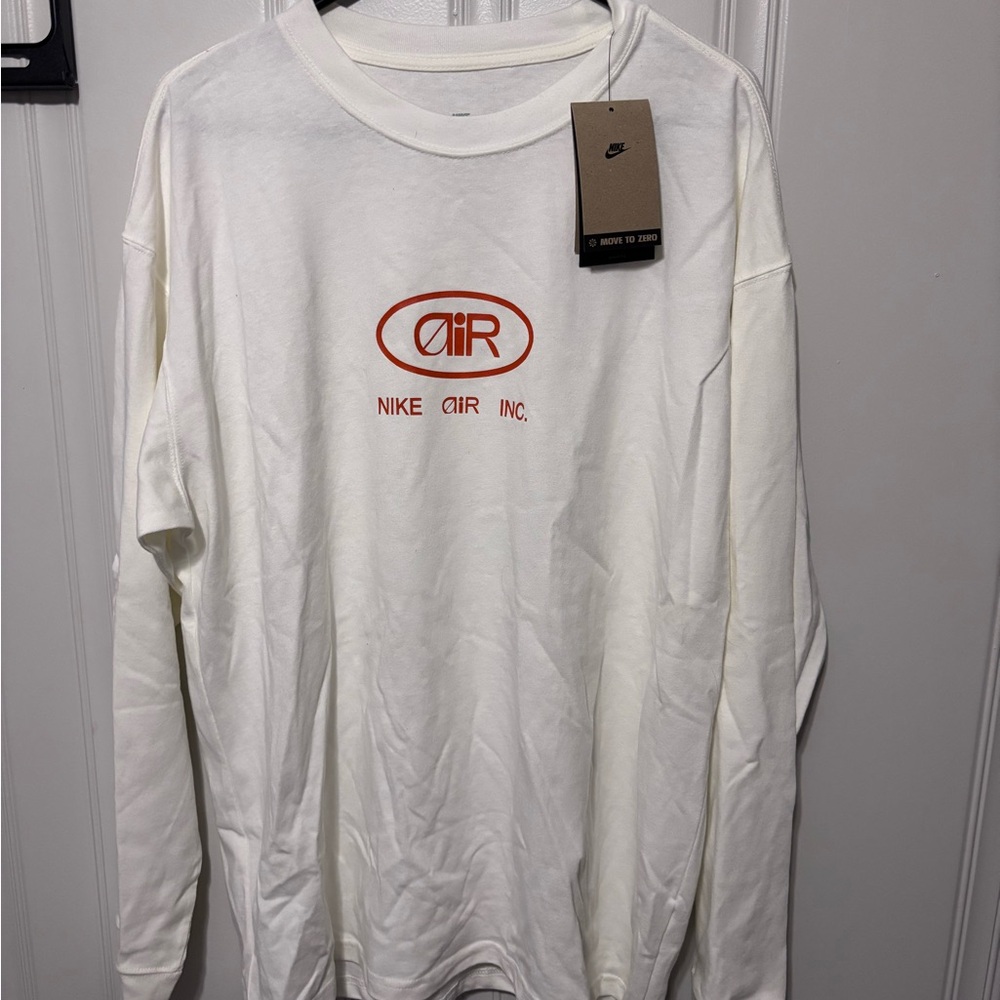Nike Air Inc. Men's Long-Sleeve Logo Tee in White with Red Orange Graphic